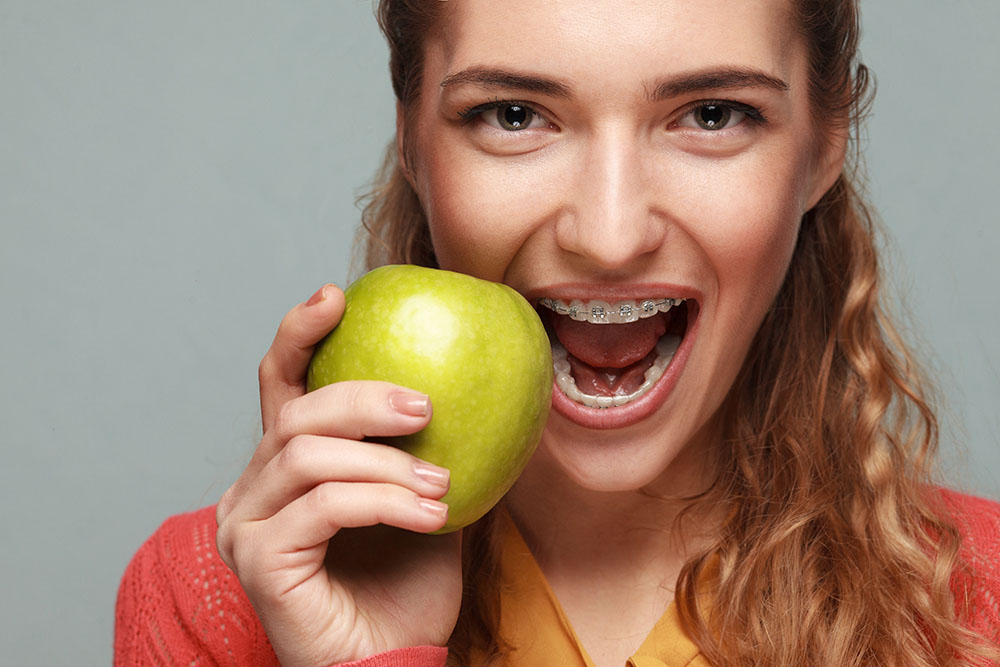 Closeup portrait of girl with brackets